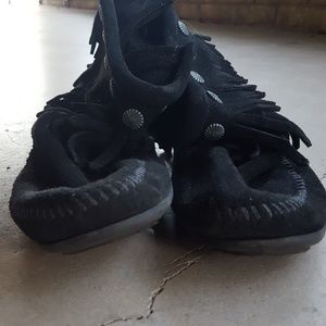 Black fringe moccasins